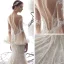 Charmant Champagne Transparentes Robe De Mariée 2019 Trompette / Sirène Encolure Dégagée Manches de cloche Appliques En Dentelle Glitter Fait main Perlage Chapel Train Volants