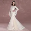 Elegant Champagne Pierced Wedding Dresses 2018 Trumpet / Mermaid Square Neckline Long Sleeve Backless Appliques Lace Sweep Train