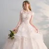 Chic / Beautiful Champagne See-through Wedding Dresses 2018 Ball Gown Scoop Neck Cap Sleeves Backless Appliques Flower Sequins Pearl Ruffle Cathedral Train