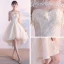 Erschwinglich Schöne Abiballkleider 2017 Mit Spitze Applikationen Rückenfreies Off Shoulder Kurze Ärmel Asymmetrisch Champagner Ballkleid