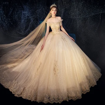 Bling Bling Champagne Robe De Mariée 2019 Robe Boule De L 039 Épaule Manches Courtes Dos Nu Perlage Appliques En Dentelle Glitter Tulle Royal Train Volants