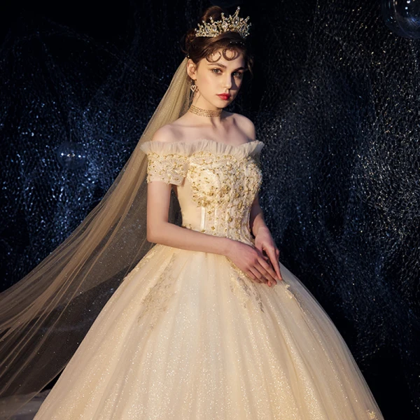 Bling Bling Champagne Wedding Dresses 2019 Ball Gown Off-The-Shoulder Short Sleeve Backless Beading Appliques Lace Glitter Tulle Royal Train Ruffle