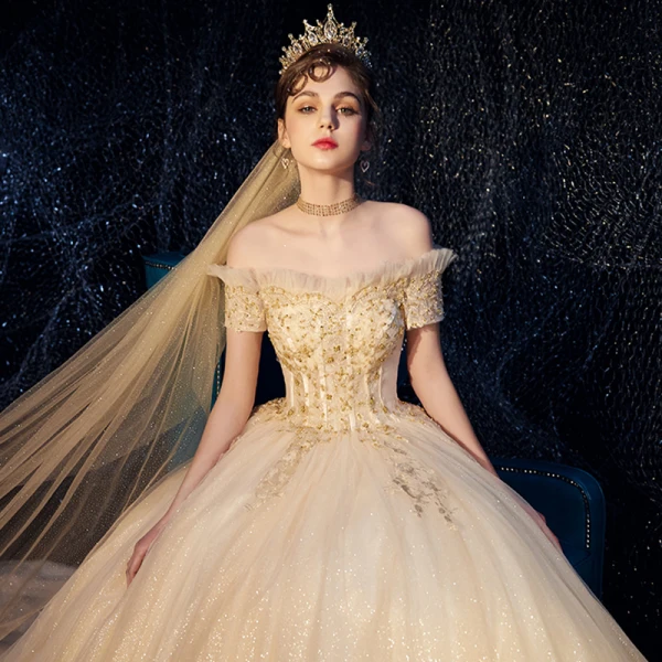 Bling Bling Champagne Wedding Dresses 2019 Ball Gown Off-The-Shoulder Short Sleeve Backless Beading Appliques Lace Glitter Tulle Royal Train Ruffle