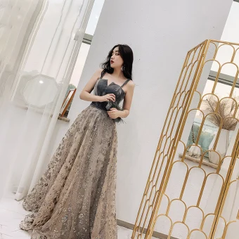 Élégant Champagne Daim Robe De Soirée 2019 Princesse Épaules Sans Manches Glitter Tulle Longue Volants Dos Nu Robe De Ceremonie