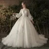 Elegant Ivory See-through Wedding Dresses 2019 Princess Scoop Neck Puffy Long Sleeve Backless Appliques Lace Chapel Train Ruffle