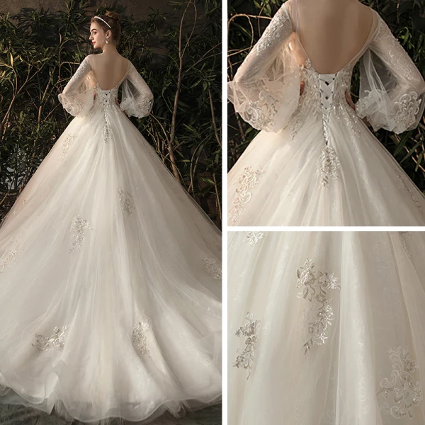 Elegante Ivory / Creme Durchsichtige Brautkleider / Hochzeitskleider 2019 Prinzessin Rundhalsausschnitt Geschwollenes Lange Ärmel Rückenfreies Applikationen Spitze Kapelle-Schleppe Rüschen
