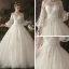Elegante Ivory / Creme Durchsichtige Brautkleider / Hochzeitskleider 2019 Prinzessin Rundhalsausschnitt Geschwollenes Lange Ärmel Rückenfreies Applikationen Spitze Kapelle-Schleppe Rüschen
