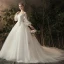 Élégant Ivoire Transparentes Robe De Mariée 2019 Princesse De l'épaule Gonflée Manches Longues Dos Nu Appliques En Dentelle Fleur Perle Chapel Train Volants