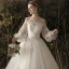 Élégant Ivoire Transparentes Robe De Mariée 2019 Princesse De l'épaule Gonflée Manches Longues Dos Nu Appliques En Dentelle Fleur Perle Chapel Train Volants