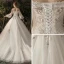 Élégant Ivoire Transparentes Robe De Mariée 2019 Princesse De l'épaule Gonflée Manches Longues Dos Nu Appliques En Dentelle Fleur Perle Chapel Train Volants
