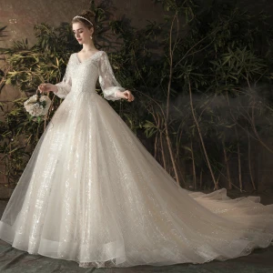 Bling Bling Champagne Gjennomsiktig Brudekjoler 2019 Prinsesse V Hals Puffy 3 4 Ermer Ryggløse Paljetter Beading Glitter Tyll Chapel Train Buste