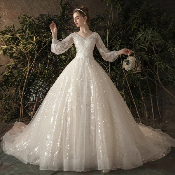 Bling Bling Champagner Durchsichtige Brautkleider / Hochzeitskleider 2019 A Linie V-Ausschnitt Geschwollenes 3/4 Ärmel Rückenfreies Pailletten Perlenstickerei Glanz Tülle Kapelle-Schleppe Rüschen