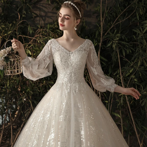 Bling Bling Champagner Durchsichtige Brautkleider / Hochzeitskleider 2019 A Linie V-Ausschnitt Geschwollenes 3/4 Ärmel Rückenfreies Pailletten Perlenstickerei Glanz Tülle Kapelle-Schleppe Rüschen