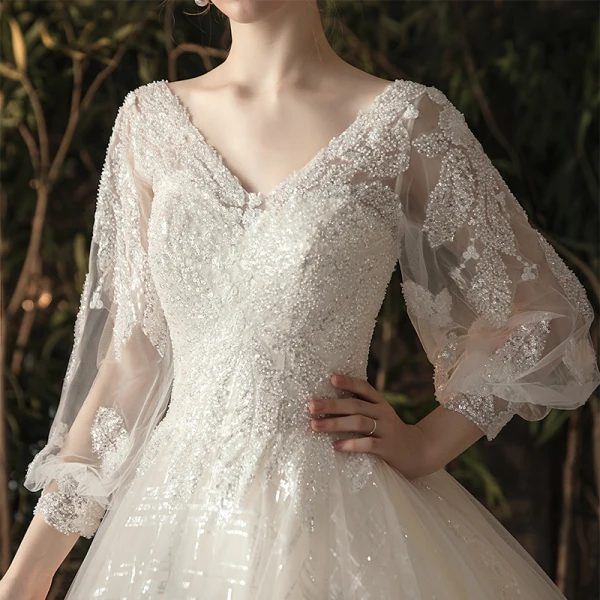 Bling Bling Champagner Durchsichtige Brautkleider / Hochzeitskleider 2019 A Linie V-Ausschnitt Geschwollenes 3/4 Ärmel Rückenfreies Pailletten Perlenstickerei Glanz Tülle Kapelle-Schleppe Rüschen