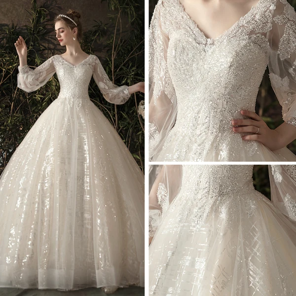 Bling Bling Champagner Durchsichtige Brautkleider / Hochzeitskleider 2019 A Linie V-Ausschnitt Geschwollenes 3/4 Ärmel Rückenfreies Pailletten Perlenstickerei Glanz Tülle Kapelle-Schleppe Rüschen