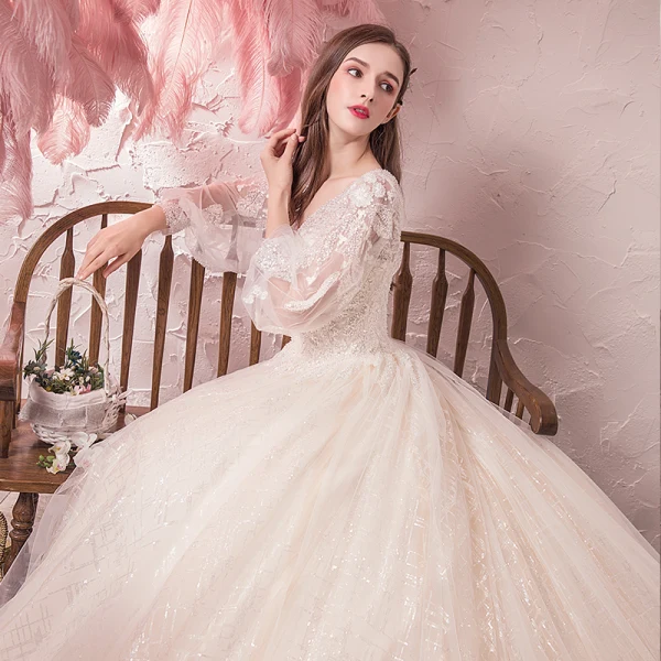 Bling Bling Champagne Robe De Mariée 2019 Princesse V-Cou Transparentes Gonflée 3/4 Manches Dos Nu Paillettes Perlage Glitter Tulle Chapel Train Volants