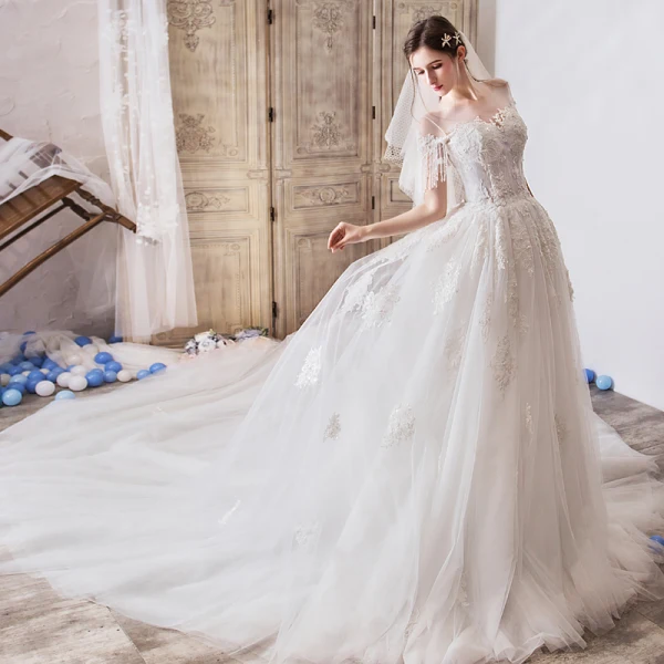 Elegant Ivory See-through Wedding Dresses 2019 A-Line / Princess Scoop Neck Short Sleeve Beading Tassel Appliques Lace Cathedral Train Ruffle Elegant Ivory See-through Wedding Dresses 2019 A-Line / Princess Scoop Neck Short Sleeve Beading Tassel Appliques Lace Cathedral Train Ruffle