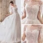 Élégant Ivoire Transparentes Robe De Mariée 2019 Princesse Encolure Dégagée Manches Courtes Perlage Gland Appliques En Dentelle Cathedral Train Volants