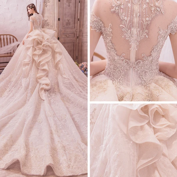 Vintage / Originale Champagne Transparentes Robe De Mariée 2019 Robe Boule Col Haut Manches Courtes Dos Nu Fait main Perlage Appliques En Dentelle Glitter Tulle Royal Train Volants