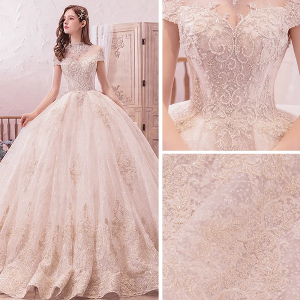 Vintage / Originale Champagne Transparentes Robe De Mariée 2019 Robe Boule Col Haut Manches Courtes Dos Nu Fait main Perlage Appliques En Dentelle Glitter Tulle Royal Train Volants