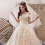 Beste Champagner Brautkleider / Hochzeitskleider 2019 A Linie Off Shoulder Kurze Ärmel Rückenfreies Applikationen Spitze Perlenstickerei Königliche Schleppe Rüschen