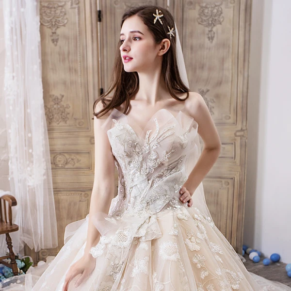 Chic / Beautiful Champagne Wedding Dresses 2019 Ball Gown Sweetheart Sleeveless Backless Glitter Appliques Lace Beading Royal Train Ruffle