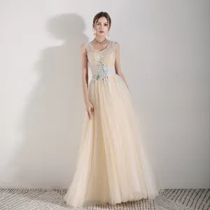 Chic Beautiful Champagne Evening Dresses 2019 A Line Princess Shoulders Sleeveless Appliques Lace Beading Floor Length Long Ruffle Backless Formal Dresses