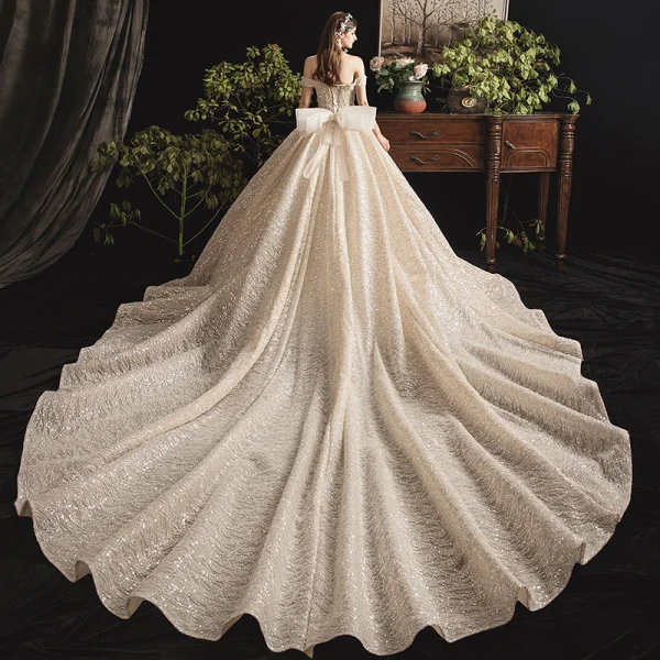 Bling Bling Champagne Wedding Dresses 2019 Ball Gown Off-The-Shoulder Short Sleeve Backless Glitter Sequins Tulle Cathedral Train Ruffle