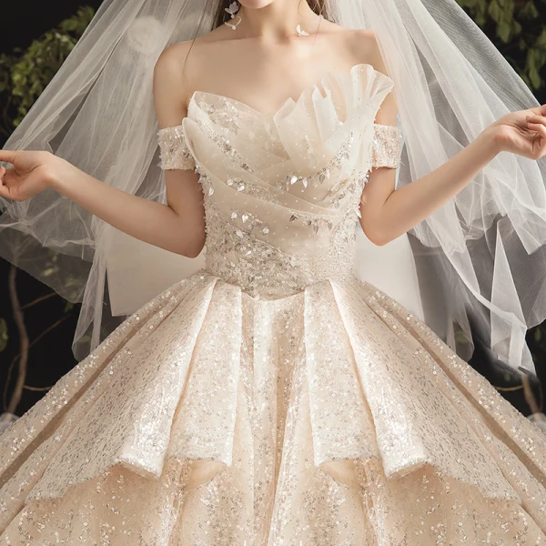 Bling Bling Champagne Wedding Dresses 2019 Ball Gown Off-The-Shoulder Short Sleeve Backless Glitter Sequins Tulle Cathedral Train Ruffle