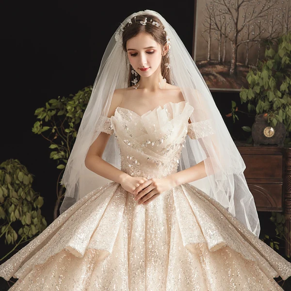 Bling Bling Champagne Wedding Dresses 2019 Ball Gown Off-The-Shoulder Short Sleeve Backless Glitter Sequins Tulle Cathedral Train Ruffle
