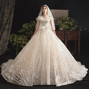 Bling Bling Champagne Brudekjoler 2019 Ballkjole Fantastiske Unike Av Skulderen Korte Ermer Ryggløse Glitter Paljetter Tyll Chapel Train Buste