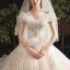 Bling Bling Champagne Robe De Mariée 2019 Robe Boule Unique De l'épaule Manches Courtes Dos Nu Glitter Paillettes Tulle Chapel Train Volants