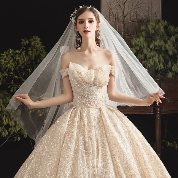 Bling Bling Champagne Wedding Dresses 2019 Ball Gown Off-The-Shoulder Short Sleeve Backless Glitter Tulle Cathedral Train Ruffle