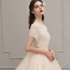 Vintage / Retro Champagne Wedding Dresses 2019 A-Line / Princess High Neck Short Sleeve Backless Beading Pearl Sash Cathedral Train Ruffle