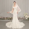 Best Champagne See-through Wedding Dresses 2019 Trumpet / Mermaid Scoop Neck Bell sleeves Backless Appliques Lace Beading Chapel Train Ruffle