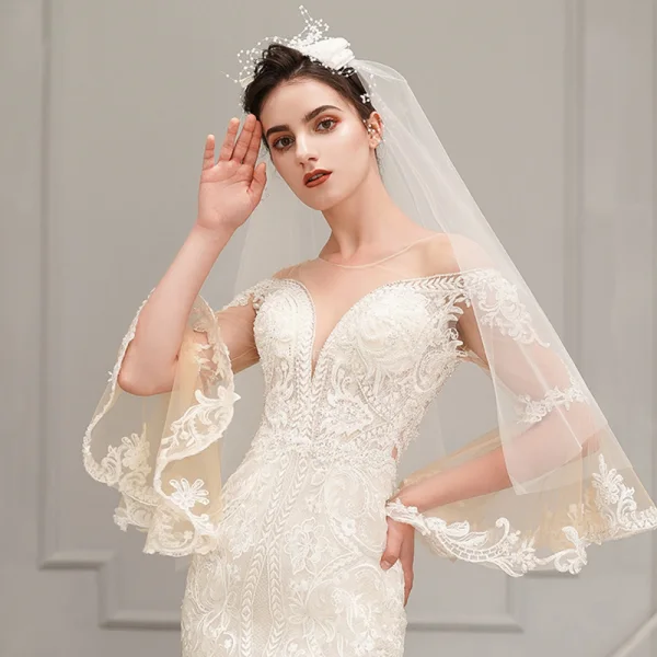 Best Champagne See-through Wedding Dresses 2019 Trumpet / Mermaid Scoop Neck Bell sleeves Backless Appliques Lace Beading Chapel Train Ruffle