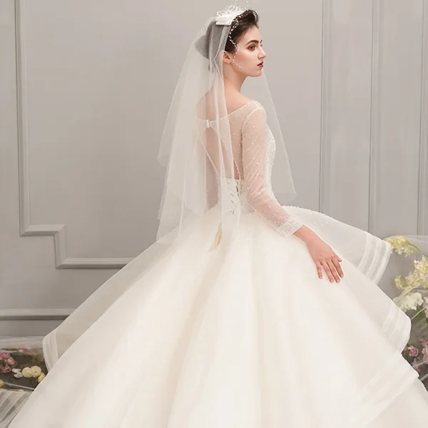 Luxury / Gorgeous Ivory See-through Wedding Dresses 2019 Ball Gown Scoop Neck 3/4 Sleeve Backless Beading Cathedral Train Cascading Ruffles