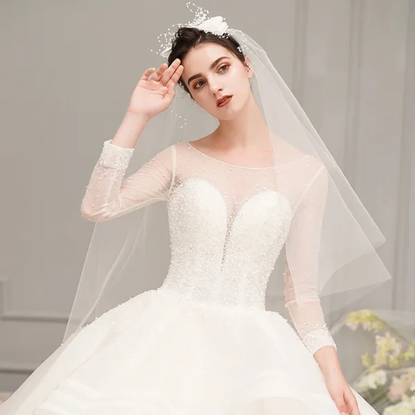 Luxury / Gorgeous Ivory See-through Wedding Dresses 2019 Ball Gown Scoop Neck 3/4 Sleeve Backless Beading Cathedral Train Cascading Ruffles