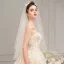 Elegant Champagne Brudekjoler 2019 Prinsesse Spaghettistropper Uten Ermer Ryggløse Glitter Appliques Blonder Perle Beading Chapel Train Buste