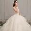 Romantique Champagne Transparentes Robe De Mariée 2019 Robe Boule Encolure Dégagée Sans Manches Dos Nu Glitter Appliques En Dentelle Perlage Cathedral Train Volants