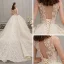Romantique Champagne Transparentes Robe De Mariée 2019 Robe Boule Encolure Dégagée Sans Manches Dos Nu Glitter Appliques En Dentelle Perlage Cathedral Train Volants