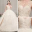 Romantique Champagne Transparentes Robe De Mariée 2019 Robe Boule Encolure Dégagée Sans Manches Dos Nu Glitter Appliques En Dentelle Perlage Cathedral Train Volants