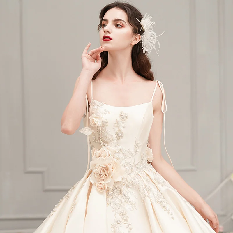 Elegant Champagne Satin Wedding Dresses 2019 A Line Princess Spaghetti  Straps Sleeveless Backless Appliques Flower Beading Cathedral Train Ruffle