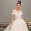 Élégant Champagne Robe De Mariée 2019 Princesse De l'épaule Manches Courtes Dos Nu Perlage Appliques En Dentelle Glitter Tulle Cathedral Train Volants