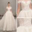 Élégant Champagne Robe De Mariée 2019 Princesse De l'épaule Manches Courtes Dos Nu Perlage Appliques En Dentelle Glitter Tulle Cathedral Train Volants