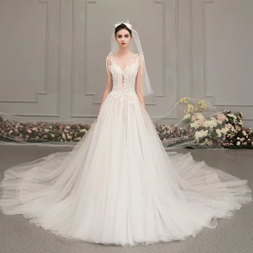 Élégant Ivoire Robe De Mariée 2019 Princesse Col V Profond Sans Manches Dos Nu Appliques En Dentelle Perlage Cathedral Train Volants