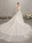 Élégant Ivoire Robe De Mariée 2019 Princesse Col v profond Sans Manches Dos Nu Appliques En Dentelle Perlage Cathedral Train Volants
