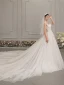 Élégant Ivoire Robe De Mariée 2019 Princesse Col v profond Sans Manches Dos Nu Appliques En Dentelle Perlage Cathedral Train Volants