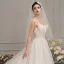 Élégant Ivoire Robe De Mariée 2019 Princesse Col v profond Sans Manches Dos Nu Appliques En Dentelle Perlage Cathedral Train Volants