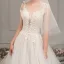 Élégant Ivoire Robe De Mariée 2019 Princesse Col v profond Sans Manches Dos Nu Appliques En Dentelle Perlage Cathedral Train Volants